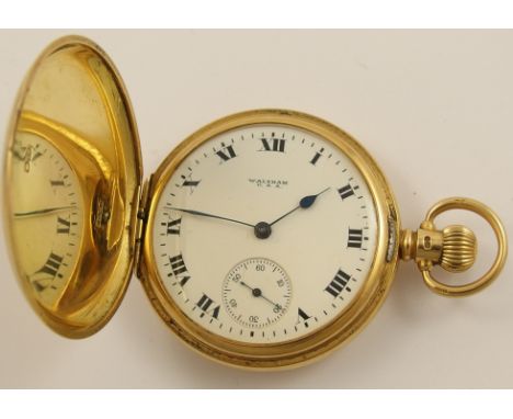 An 18ct gold Waltham hunter pocket watch with white enamel dial black Roman numerals subsidiary seconds dial and blued steel 