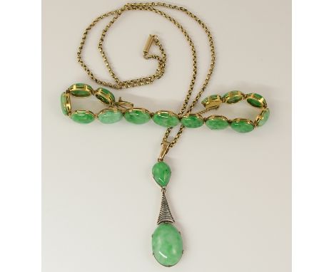 A Chinese green hardstone pendant and bracelet the pendant is in yellow and white metal with a 9ct 'tagged' vintage chain, th