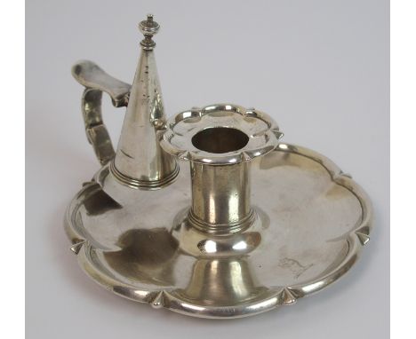 A silver chamber stick probably by William Eaton, London 1827, of shaped circular form with removable drip-pan and snuffer, b