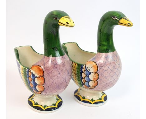 A pair of Wemyss Ware duck sauce boats each painted in various colours and on circular moulded bases, impressed marks R H & S