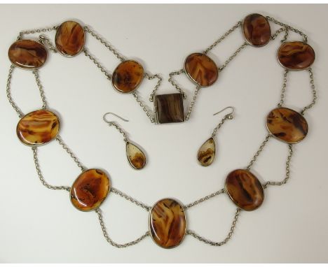An agate panel necklace mounted in white metal with matching earrings, length 53.5cm