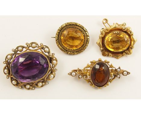 A collection of vintage brooches a yellow metal amethyst and pearl brooch with pierced floral border, 32mm x 21mm. A 15ct gol