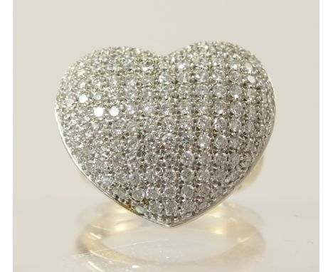 A 9ct puffed heart shaped pave diamond set ring the heart shape is also diamond set to the reverse with ten diamonds, the com