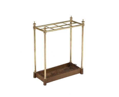 A LATE VICTORIAN BRASS AND CAST IRON STICK STANDCIRCA 1900With eight divisions above the removable drip tray64cm high, 49cm w