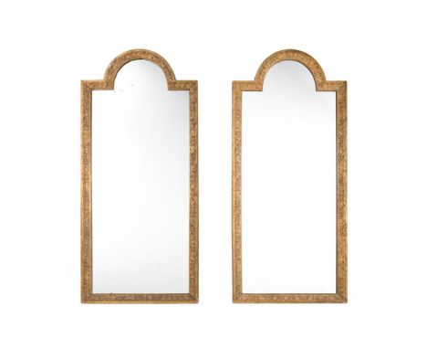 A PAIR OF GILTWOOD AND COMPOSITION WALL MIRRORS IN QUEEN ANNE STYLEEARLY 20TH CENTURYEach with an arched rectangular plate wi