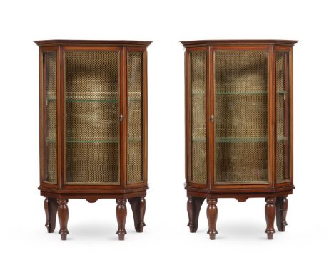 A PAIR OF MAHOGANY AND BRASS MOUNTED STANDING DISPLAY CABINETS THIRD QUARTER 19TH CENTURY AND LATER Of canted outlineeach 83c