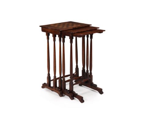 Y A NEST OF THREE GEORGE IV MAHOGANY SIDE TABLESCIRCA 1830The largest example with inset rosewood and satinwood chessboard to