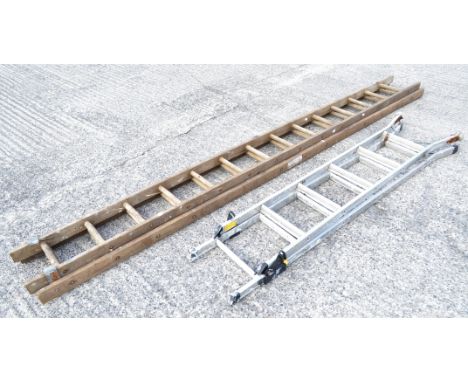 A wooden ladder and a metal step ladder