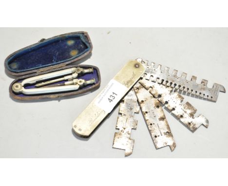 A Wynn &amp; Timmins wire gauge tool, engraved W G Blake Building Contractors, Plymouth, along with a boxed folding compass