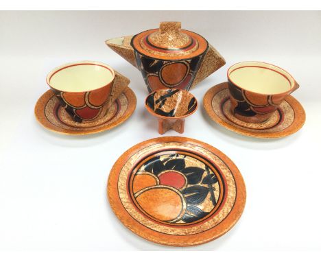 A Clarice Cliff tea for two set in Mango Cafe-Au-Lait pattern and of conical shape (5).
