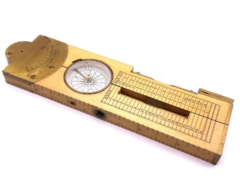 A vintage Pocket surveyors level with built in sights, compass, charts. 12 inches.