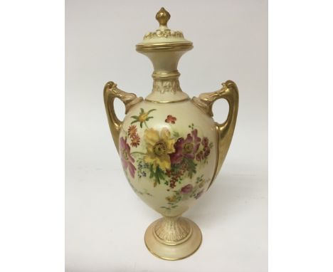 A hand painted Royal Worcester porcelain vase with flowers and foliage and applied gilt height 29cm