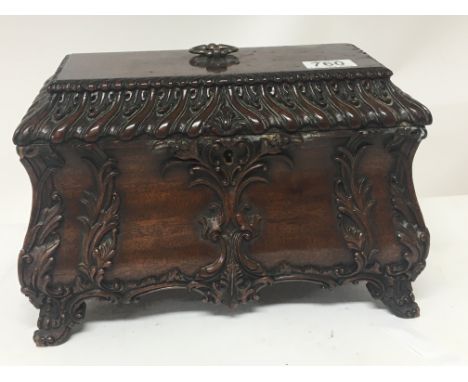 A George III style mahogany tea caddy box with elaborate moulding locked no key