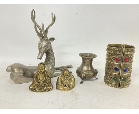 Unusual oriental brass triple bangle decorated with coloured glass beads, white metal lying down deer, small vase and small B