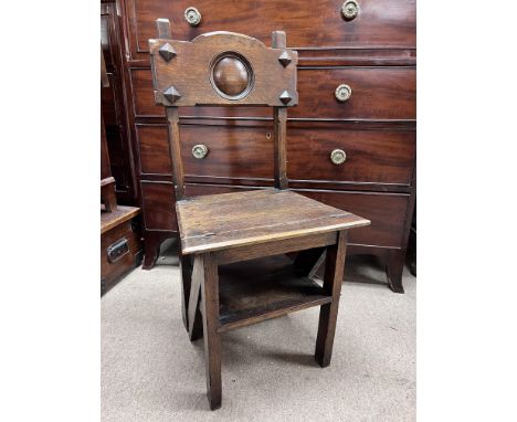An oak arts and crafts design metamorphic library chair step ladder.