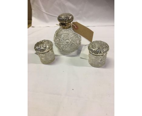  Sale Item:    2 SILVER LIDDED POTS &amp; SILVER TOPPED PERFUME BOTTLE  Vat Status:   No Vat   Buyers Premium:  This lot is s