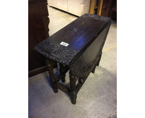  Sale Item:    OAK CARVED DROP LEAF TABLE (AF)   Vat Status:   No Vat   Buyers Premium:  This lot is subject to a Buyers Prem