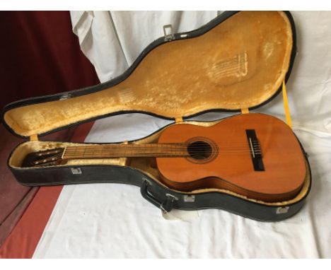  Sale Item:    CASED SPANISH GUITAR   Vat Status:   No Vat   Buyers Premium:  This lot is subject to a Buyers Premium of 15% 