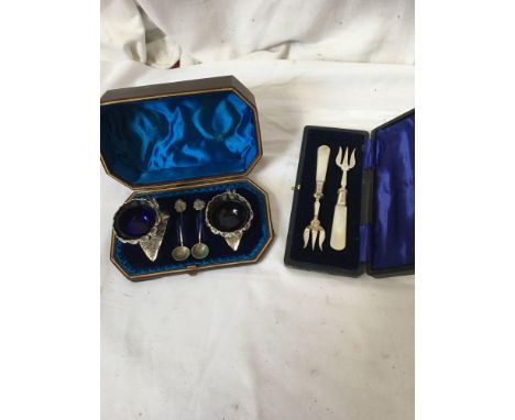  Sale Item:    CASED E P CRUETS &amp; M O P HANDLED FORKS (AF)  Vat Status:   No Vat   Buyers Premium:  This lot is subject t