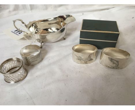  Sale Item:    4 SILVER NAPKIN RINGS &amp; SMALL GRAVY BOAT (AF)  Vat Status:   No Vat   Buyers Premium:  This lot is subject