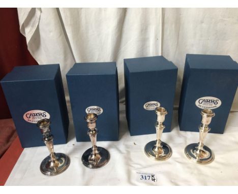  Sale Item:    4 CARRS SILVER CANDLESTICKS   Vat Status:   No Vat   Buyers Premium:  This lot is subject to a Buyers Premium 