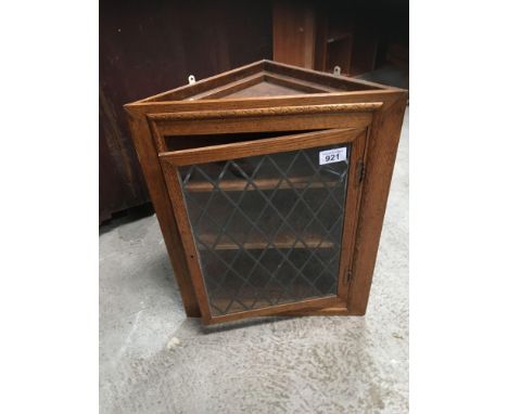  Sale Item:    OAK CORNER CABINET- LEADED GLASS   Vat Status:   No Vat   Buyers Premium:  This lot is subject to a Buyers Pre