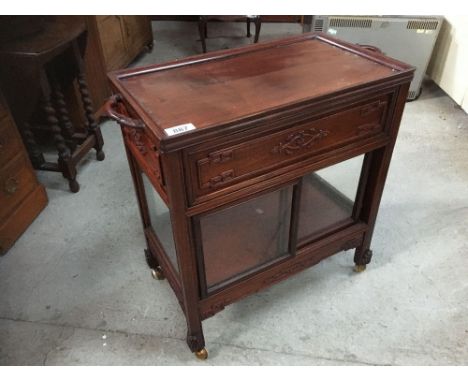  Sale Item:    MAHOGANY ORIENTAL TROLLEY (AF)   Vat Status:   No Vat   Buyers Premium:  This lot is subject to a Buyers Premi