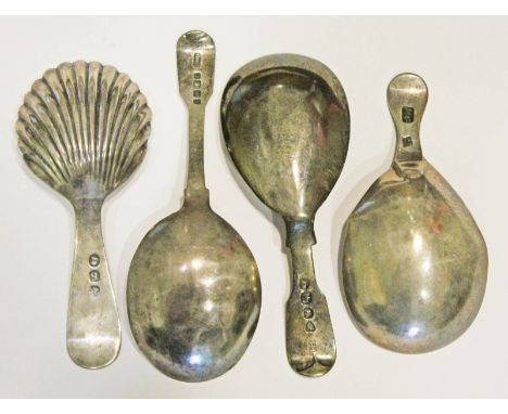 A group of four Georgian silver caddy spoons. CONDITION REPORT - two of the spoons a little thin and with dings although ther