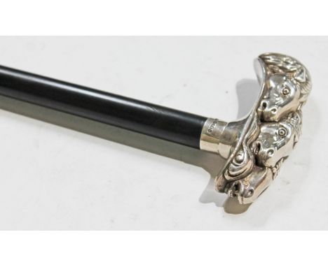 A contemporary hallmarked silver handled walking stick, the handled modelled as three horse's heads, length 93.5cm.