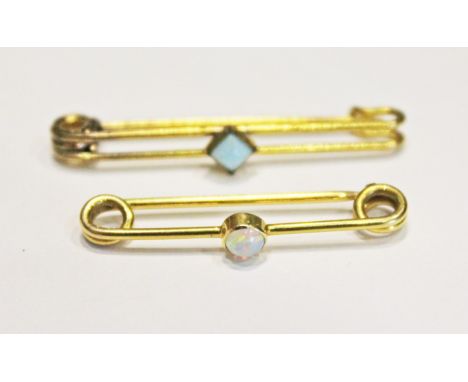 Two yellow metal brooches, one set with an opal, the other a turquoise, gross wt. 2g.