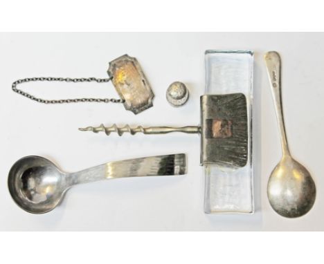 A mixed lot comprising a Scandinavian glass handled corkscrew, a KSIA ladle, a hallmarked silver decanter label, a hallmarked