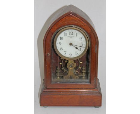 A Eureka clock company electric clock in mahogany case. H39cm CONDITION REPORT - good, not tested with an electric current bu