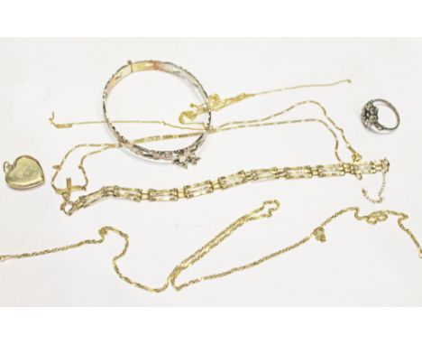 A mixed lot of 9ct gold and yellow metal chains, gross wt. 11.4g, together with a hallmarked silver bangle and a silver marca