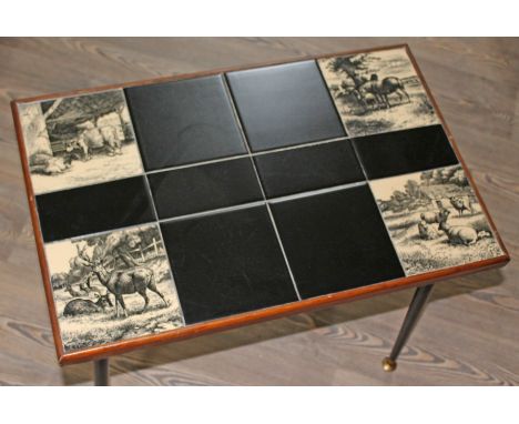 A kitsch coffee table having tile top with Mintons "Animals of the Farm" series tiles one signed 'W Wise', each 6" x 6".