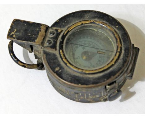 A WWII T.G. Co Ltd MK III compass.