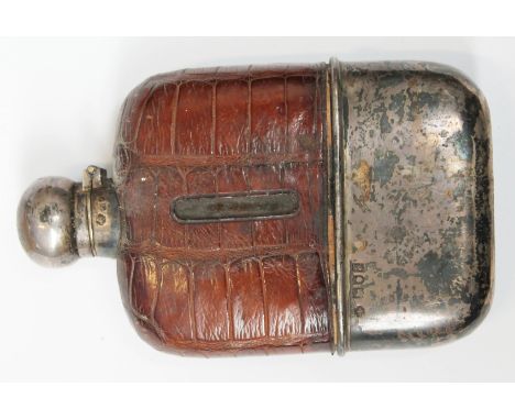 A hallmarked silver and faux crocodile skin hip flask, length 14.5cm. CONDITION REPORT - glass appears undamaged but there's 