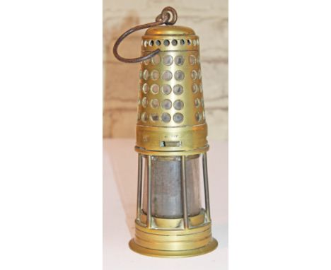A miner's safety lamp, height 26cm. CONDITION REPORT - good, top section looks as though it should also screw off but is curr