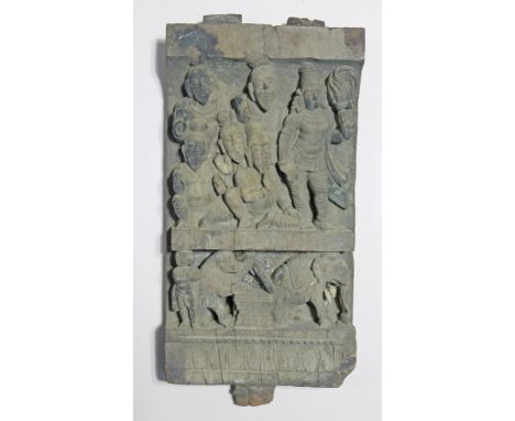 A 18th/19th Century carved Indian Hindu bracket depicting dancers and elephants, 40cm x 19cm. PROVENANCE - estate of the late