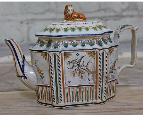 A George III English cream ware tea pot with lion finial, length 21.5cm. CONDITION REPORT - large chip to spout and chip to i