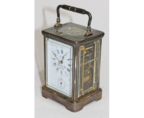 A Silver Jubilee 1977 silver plated carriage clock. H17cm CONDITION REPORT - athough it is ticking and keeping time, it does 