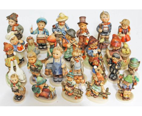 A group of 24 mainly Hummel figures (one Friedel Bavaria). CONDITION REPORT - 4 figures damaged and repaired, generally good.
