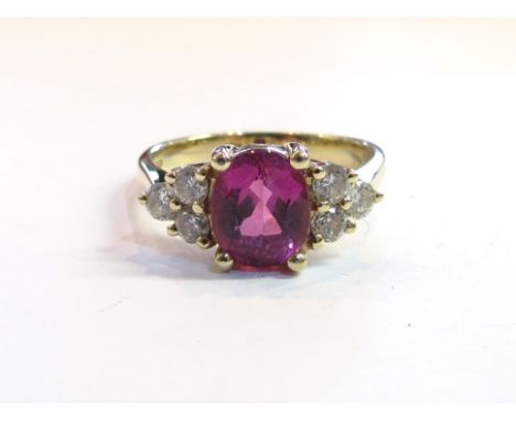 A 14ct gold diamond and oval pink stone ring, size R, 5.5g