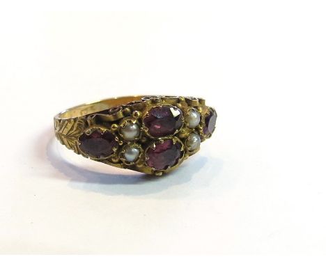 A ruby and seed pearl ring stamped 625, size J, 1.8g