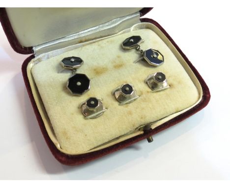 A boxed set of Art Deco cufflink's and dress studs, black enamel and seed pearls