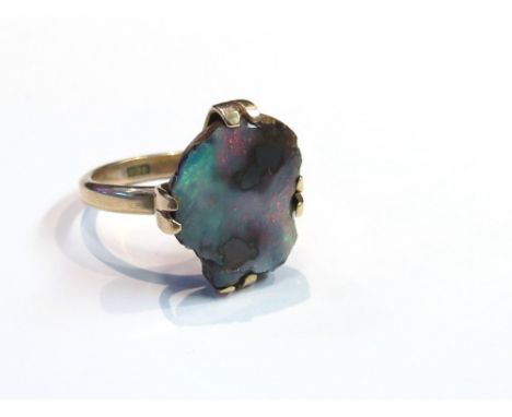 A 9ct gold ring set with rough slice opal, size L, 4.2g