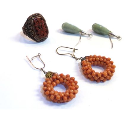 A bag containing coral bead hoop earrings, Chinese carved red lacquer stone ring and Chinese silver and jade torpedo drop ear