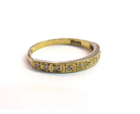 An 18ct gold diamond set half hoop ring, size R, 2.9g
