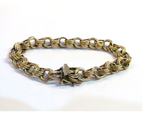 A continental gold triple ring-link bracelet, 18g