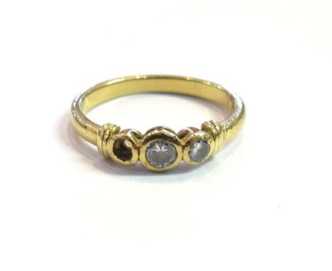 A gold three stone diamond ring (one stone missing), size K, 2.3g