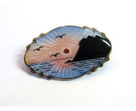 A Norwegian silver and enamel brooch depicting sunset over sea marked A.Sch